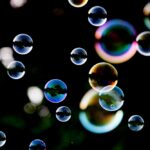 Bubbles,Isolated,On,Black,Background.,Rainbow,Soap,Bubbles,On,A